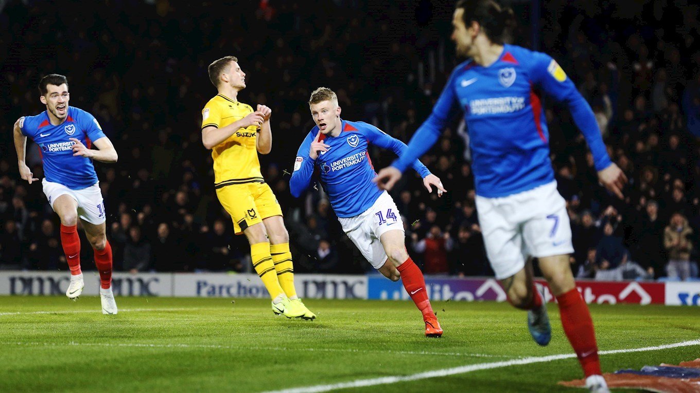 Andy Cannon celebrates scoring for Pompey against MK Dons